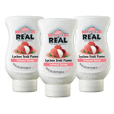Reàl Infused Exotics Lychee bottle pour, drip-free mixing for cocktails.