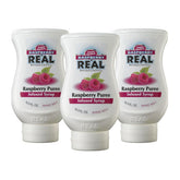 Reàl Infused Exotics Raspberry Syrup 3-pack bottles for versatile drinks.