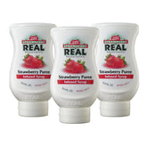 Reàl Infused Exotics strawberry syrup trio in squeeze bottles for easy mixing.