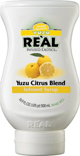 Reàl Infused Exotics Yuzu Syrup bottle close-up for bold cocktails.