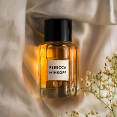 Rebecca Minkoff perfume bottle highlights tobacco warmth for evening depth