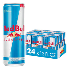 Red Bull Sugarfree 12oz can on a desk ready for action, suggesting a quick energy boost