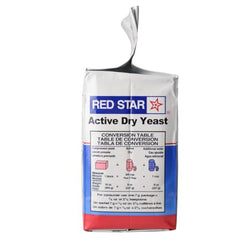 Open pack of Red Star Active Dry Yeast ready for dough preparation