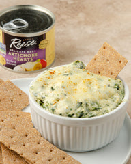 Reese artichoke hearts used in a creamy dip for sharing