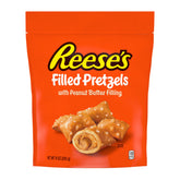 Reese's Filled Pretzels peanut butter nuggets sit on a crunchy pretzel bite for a portable snack.