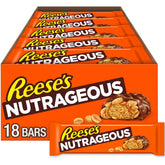 REESE'S NUTRAGEOUS bar closeup with chocolate, peanut butter, and caramel for a snack