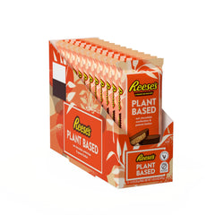 Bite shot of REESE'S Plant Based Oat Cups shows creamy peanut butter center.