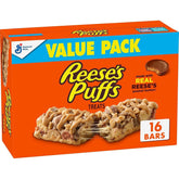 REESE'S Puffs Treat Bars with crispy cereal pieces for a quick, crave-worthy snack.