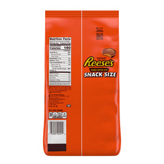 Reese's snack-size cups close-up showcasing creamy filling and chocolate.