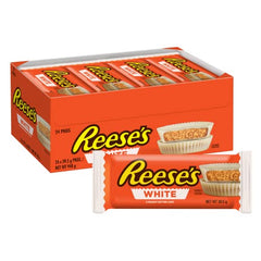 REESE'S White Creme Cups closeup shows creamy peanut butter center