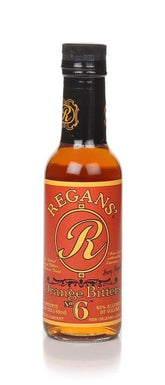 Regans Orange Bitters No.6 bottle pour highlighting citrus-forward aroma for cocktails.