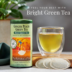 The Republic of Tea Ginger Peach Green Tea tea bags close-up shows fresh leaves for a bright cup.