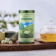 The decaf People's Green Tea tea bags close-up highlights premium, smooth flavor.