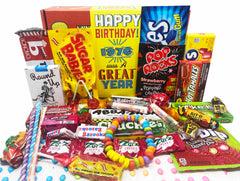 Retro Candy Yum 1976 gift box displaying nostalgic candies for a milestone celebration.