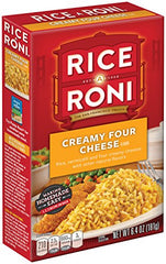 Rice-A-Roni Creamy Four Cheese in a steamy pot ready to serve.