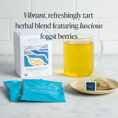 A warm cup of steeped Rishi Tea Greek Mountain Tea with a calming aroma