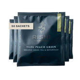 Rishi Tea Yuzu Peach Green sachet close-up for easy organic brewing.
