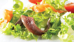 Roland anchovies poured over pasta for a quick flavor boost