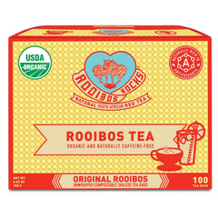 Rooibos Rocks red tea bags steeping in a hot cup, caffeine-free comfort.