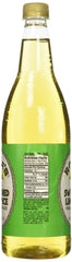 Pouring Rose's Sweetened Lime Juice into a glass for easy cocktails