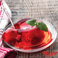 Royal Strawberry Gelatin Dessert Mix dissolving in cold water to set quickly.