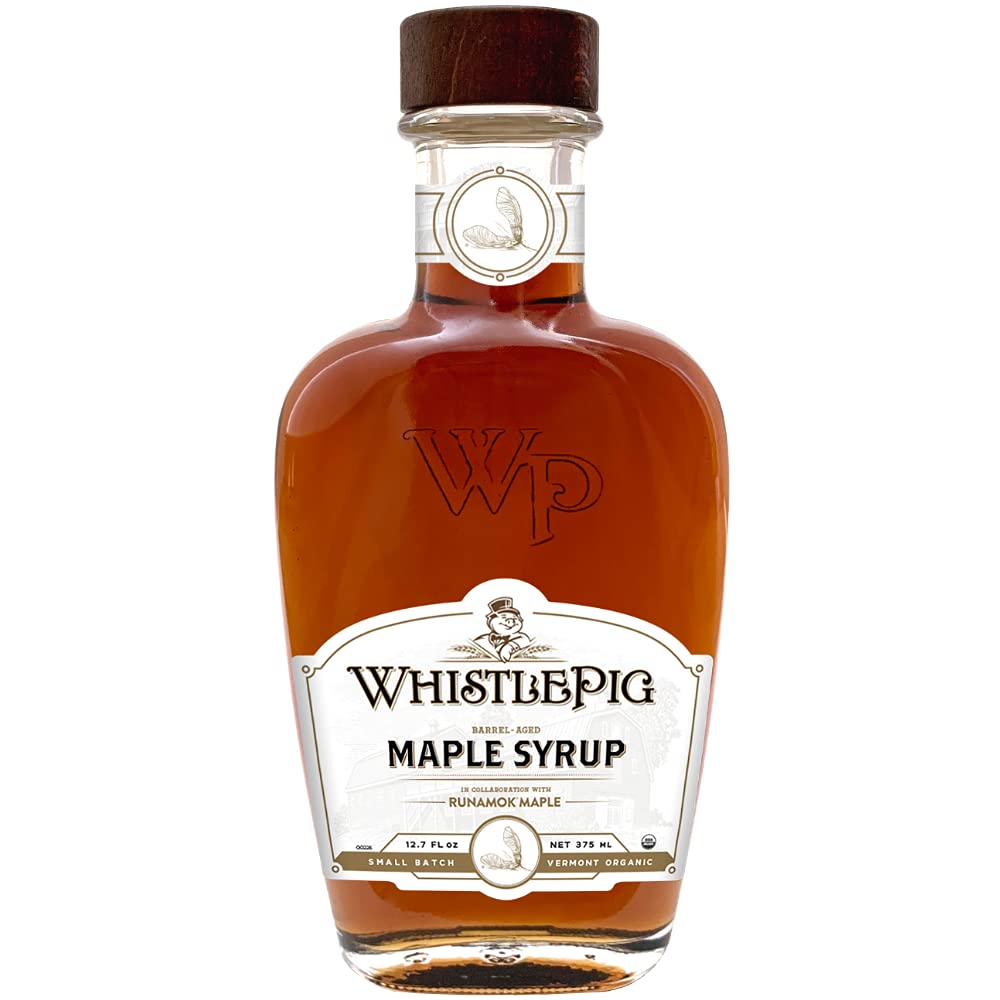 Runamok WhistlePig bottle front close-up showcases a rich maple syrup aged in rye whiskey casks for bold finish.
