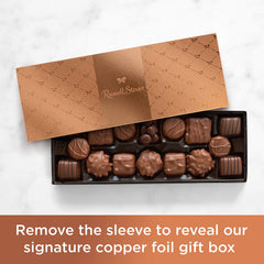 Close-up of Russell Stover milk chocolate caramel piece for indulgence.
