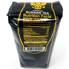 Russian Tea Tea Czar Nikolas II loose-leaf tea viewed in a scoop, highlighting aroma and quality.