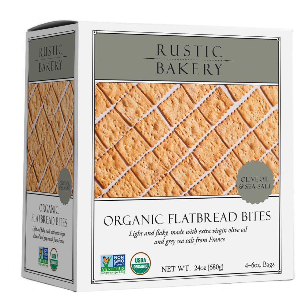Rustic Bakery sourdough crackers with olive oil and sel gris beside cheese.