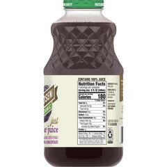 R.W. Knudsen Organic Prune Juice glass pour showing smooth color.