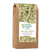 Sacred Blossom Farm Milky Oats bottle pour, ready for a tea ritual.