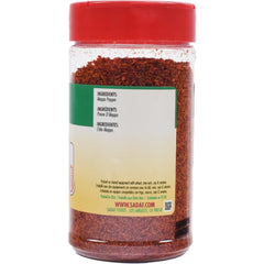 Sadaf Aleppo Pepper flakes close-up showing rich red color and texture.