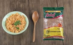 Sadaf bulghur 4 extra coarse grains on a spoon, showing hearty bite.