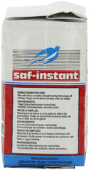 SAF Instant Yeast pouring into bowl for seamless dough mixing.