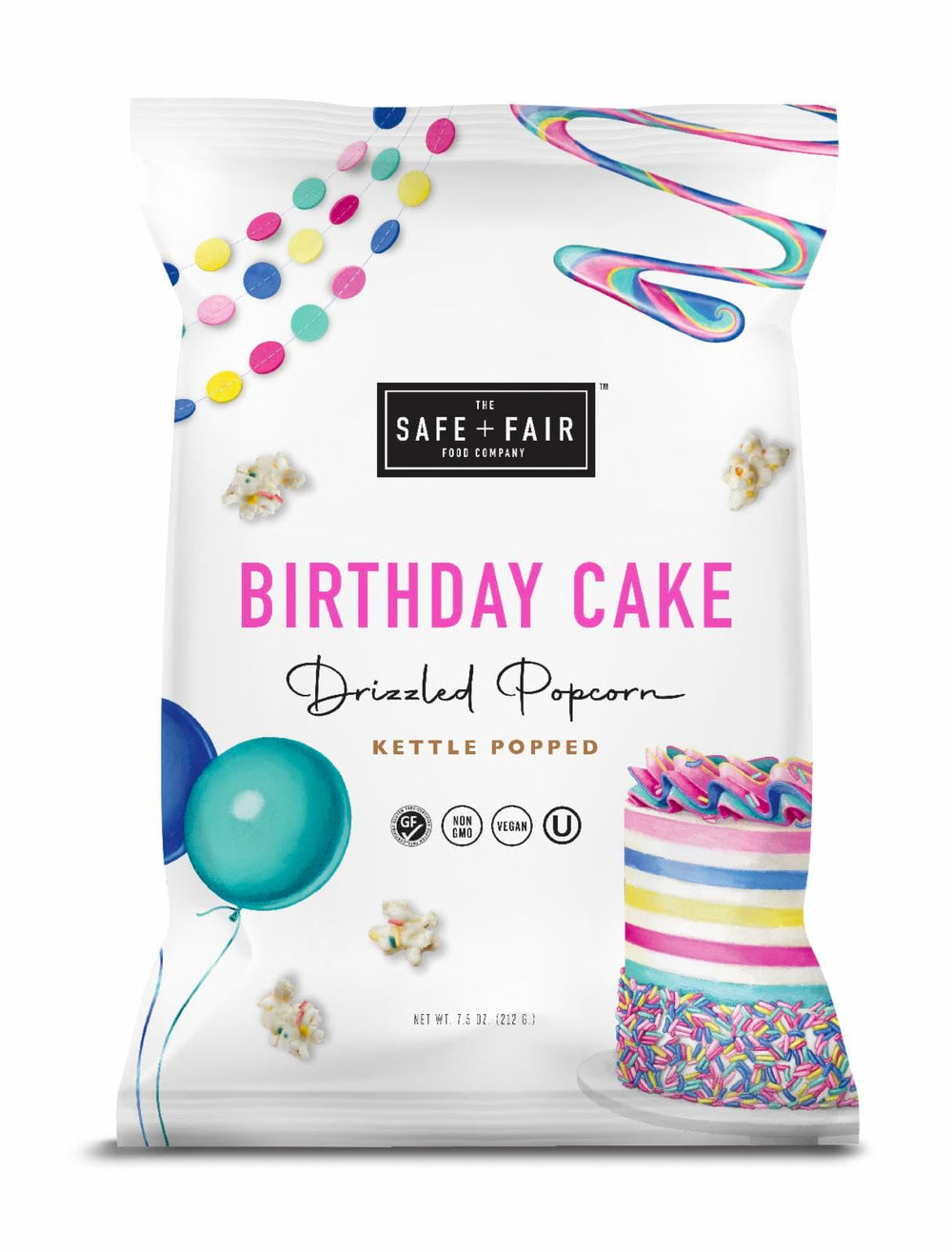 The Safe + Fair Birthday Cake Drizzled Popcorn packaging showing gluten-free and vegan labels