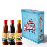 Salsa Huichol Original bottle enhances tacos with bright, authentic Mexican flavor.