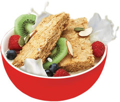 Pouring Weet-Bix into a bowl for a quick breakfast.