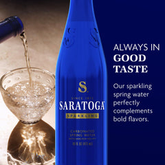 Saratoga Sparkling Water cobalt blue bottle close-up showcasing design.