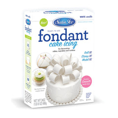 Satin Ice fondant covers a cake smoothly for a polished finish.