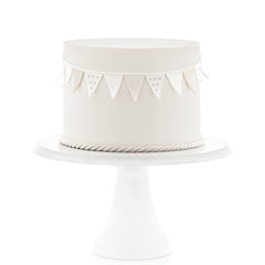 Satin Ice fondant white covers cake with even surface.