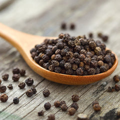 Sauer's Black Peppercorns in grinder delivering pungent aroma.