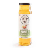 Savannah Bee honey jar close-up showing golden color and premium flavor.
