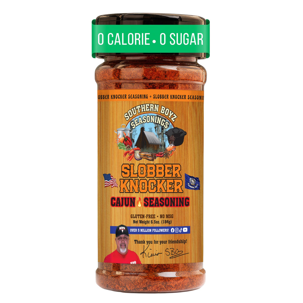 SBO Slobber Knocker bottle pouring with bold Cajun heat for grilled meats.