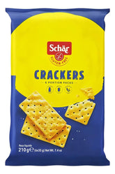 Schär gluten-free crackers on a plate for quick snacking