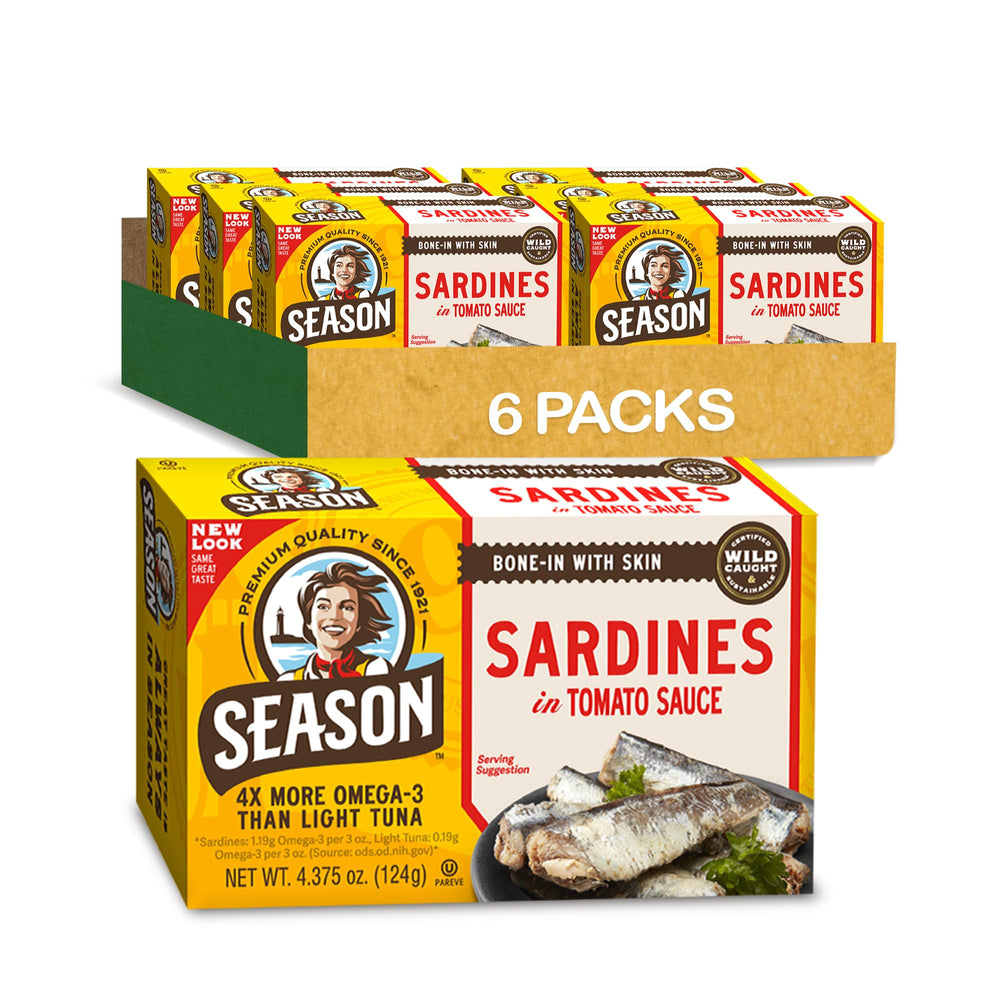 Season Sardines in Tomato Sauce can opened on wood, showcasing omega-3 richness.