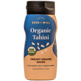 Seed + Mill tahini sauce bottle close-up showing silky, creamy texture for toppings