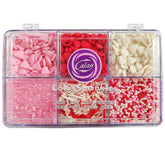 Senchanting red heart sprinkles add festive color to cookies and cupcakes.
