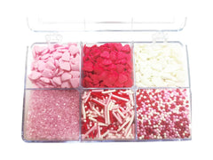 Senchanting red jimmies sprinkle for colorful cupcake toppers.