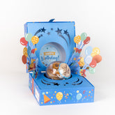 Send A Cake Happy Birthday Bloom Box front packaging enhances gift appeal with festive colors.