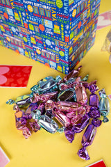 Music surprise as the Send A Cake lid opens for celebrations.